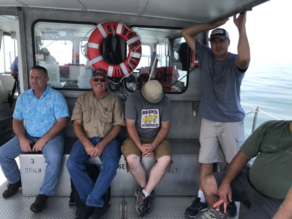 Mike Werling and other farmers at Allen County SWCD's Stay at the Pay (2021) in Put-in-Bay, OH. OSU Research Vessel trolling for Lake Erie fish species.